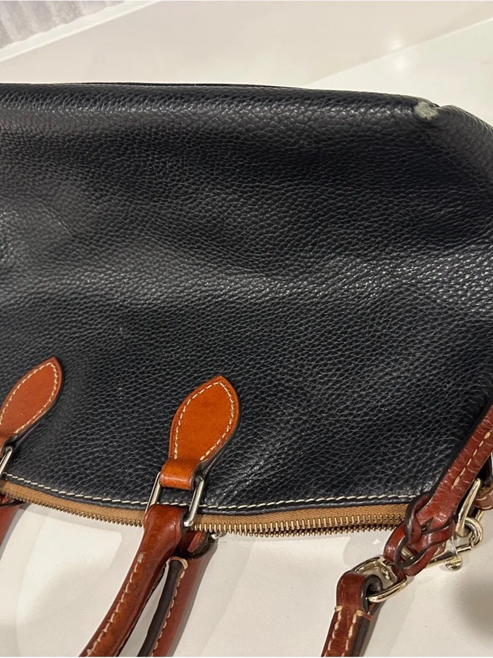 Dooney & Bourke Black Pebbled Leather Satchel with Brown Trim